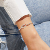 A Little 'Loved Beyond Measure' Bracelet In Silver Plating by Joma Jewellery