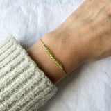 Ophelia Jewellery - Peridot Silk Bracelet: Gold filled beads