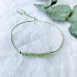 Ophelia Jewellery - Peridot Silk Bracelet: Gold filled beads