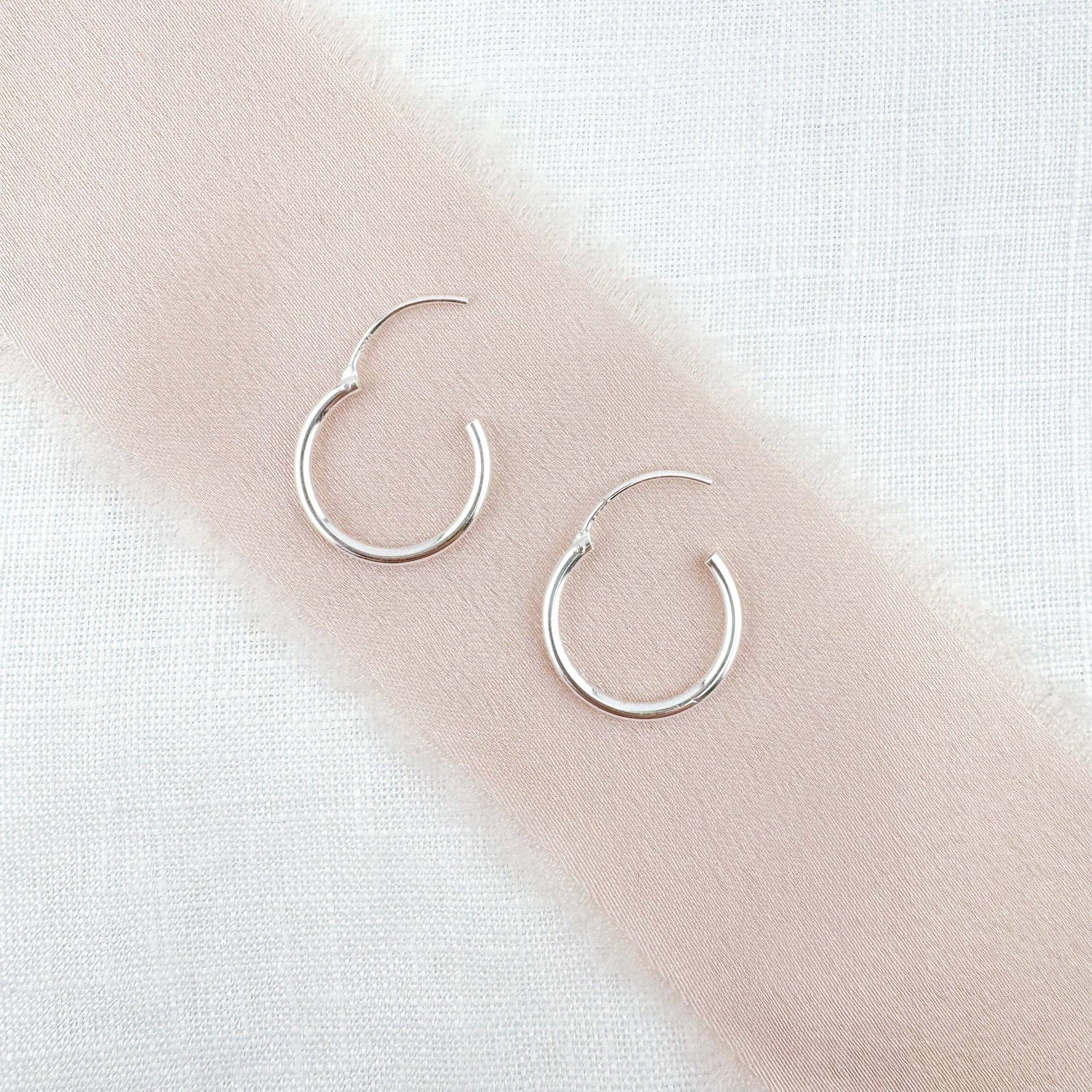 Sterling Silver and hot Crystal Endless Hoop Earrings