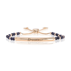 Joma Jewellery SIGNATURE STONES - DREAM engraved yellow gold bar with blue sandstone stones - bracelet - Gifteasy Online